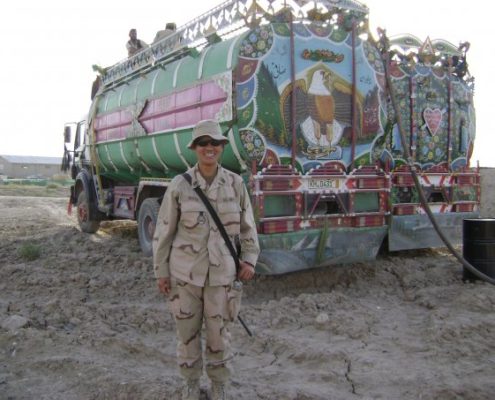 Michaela Royce - behind me were ‘Jingle Trucks’ delivering fuels to Afghanistan. My unit cleared customs, escorted trucks and inventoried fuels being delivered to Bagram. I learned to read and speak Dari while there because the locals did not speak English and my translator was nowhere to be found.